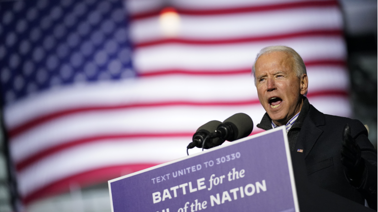 Democratic presidential candidate former Vice President Joe Biden speaks at a drive-in rally at Heinz Field, Monday, Nov. 2, 2020, in Pittsburgh. (AP Photo/Andrew Harnik)